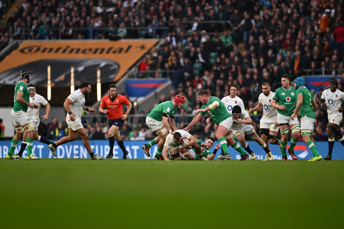 	LONDON, ENGLAND - MARCH 09: Ben Earl of England is tackled by players of Ireland, as the British Airways LED Advertising Boardis displayed, during the Guinness Six Nations 2024 match between England and Ireland at Twickenham Stadium on March 09, 2024 in London, England. (Photo by Dan Mullan - RFU/The RFU Collection via Getty Images)